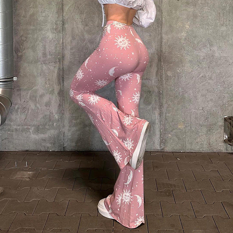 Damer Flared Yoga-byxor med lekfullt måne- och solmönster Mirla-Eva Jonsson