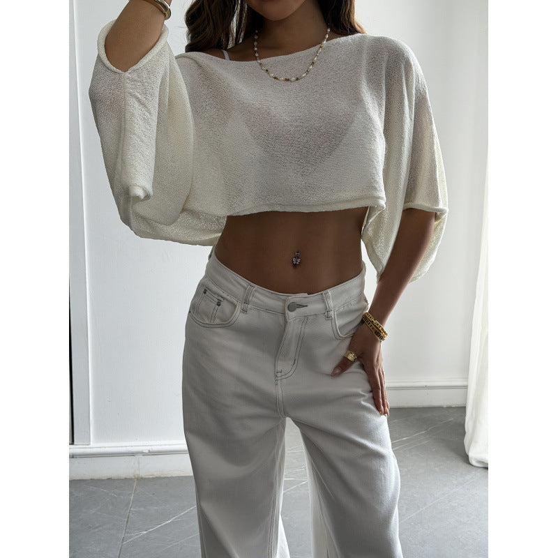 Damer Flockigt Crop-Top med asymmetrisk design och djup utskärning Mirla-Eva Jonsson