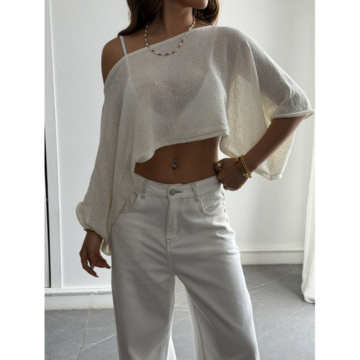 Damer Flockigt Crop-Top med asymmetrisk design och djup utskärning Mirla-Eva Jonsson