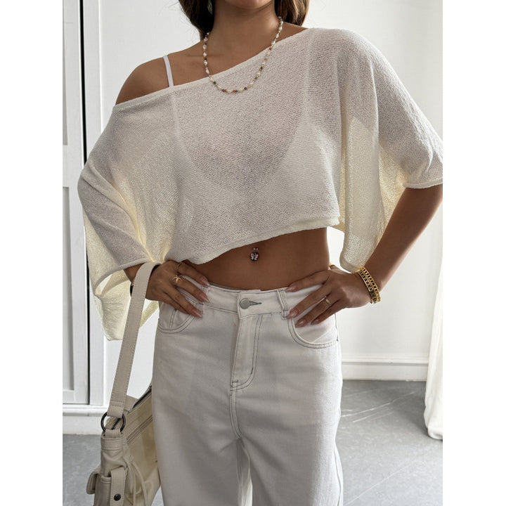 Damer Flockigt Crop-Top med asymmetrisk design och djup utskärning Mirla-Eva Jonsson