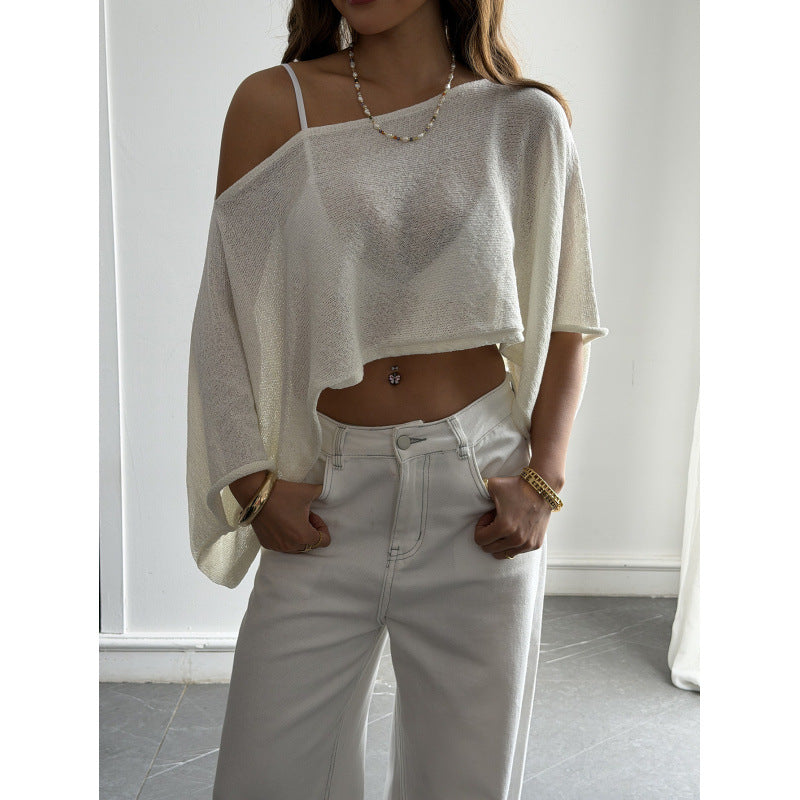 Damer Flockigt Crop-Top med asymmetrisk design och djup utskärning Mirla-Eva Jonsson