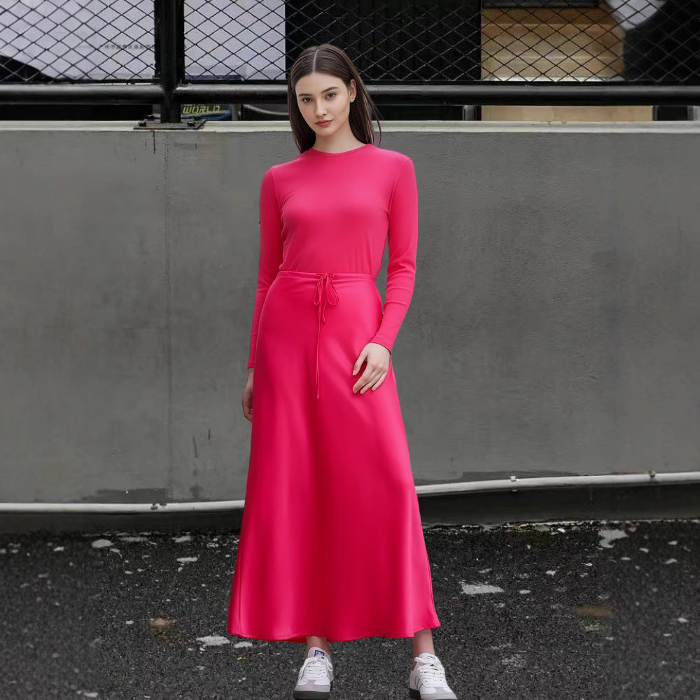 Damer Flödande Maxiklänning med eleganta långa ärmar och midjeanpassad band Mirla-Eva Jonsson