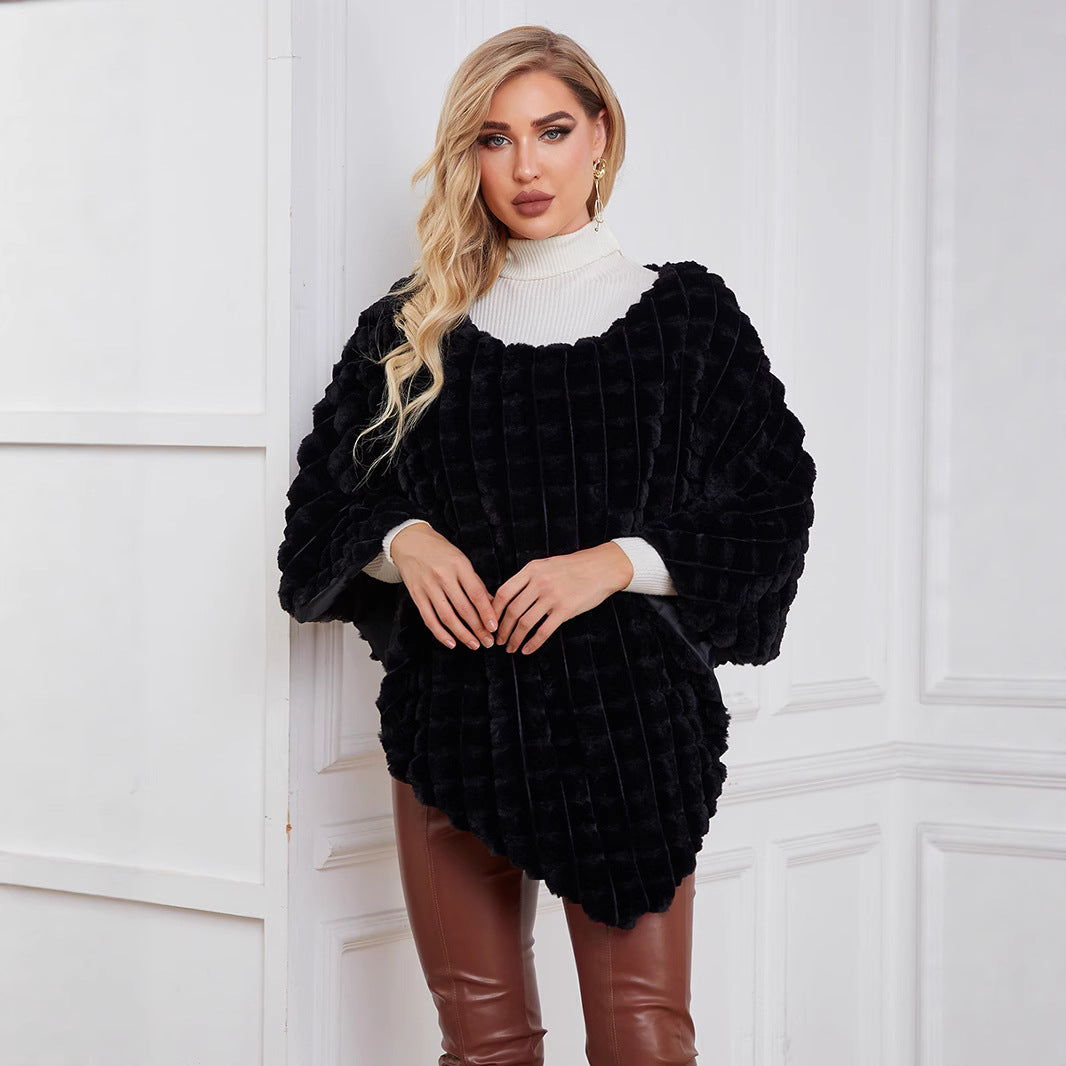 Damer Fluffig Konstpälsponcho med strukturerad design och mjukt foder Mirla-Eva Jonsson