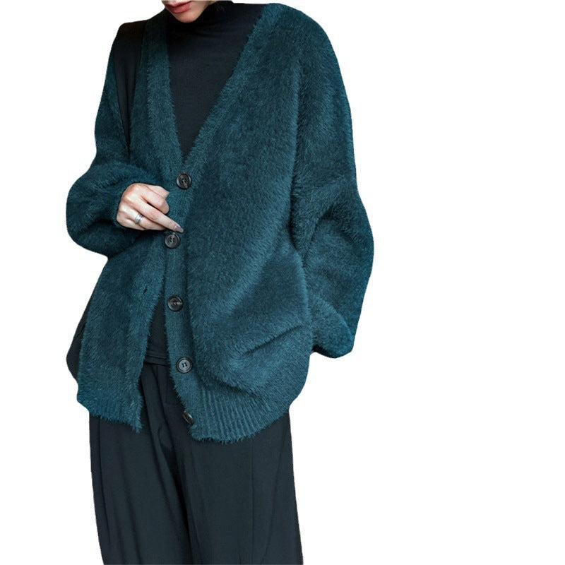 Damer Fluffy stickad cardigan med V-ringning och praktiska knappar Mirla-Eva Jonsson