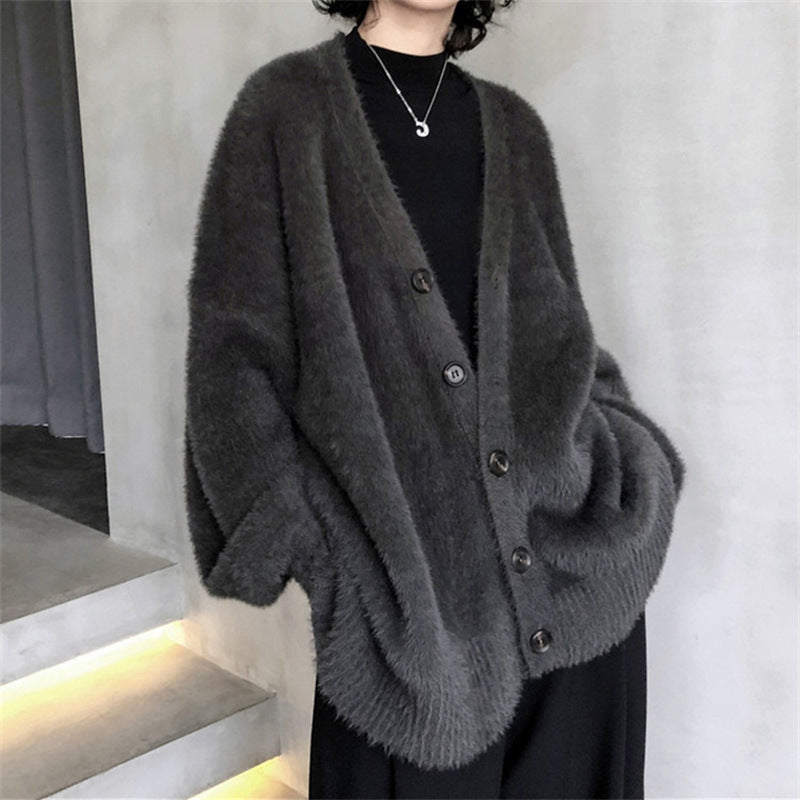 Damer Fluffy stickad cardigan med V-ringning och praktiska knappar Mirla-Eva Jonsson