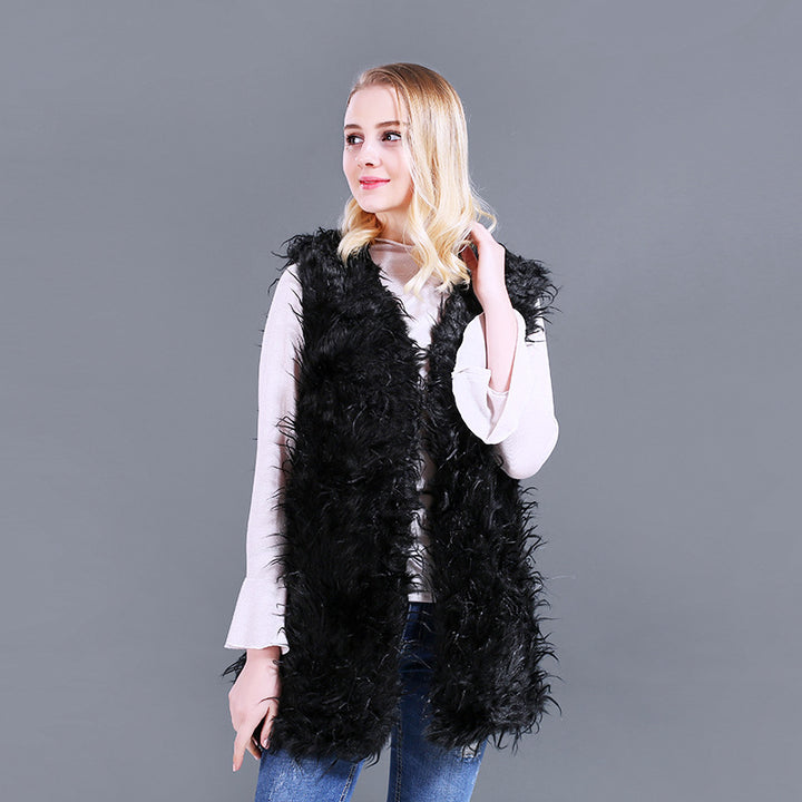 Damer Fuzzy Kaftan-väst av konstpäls med djup V-ringning och sidofickor Mirla-Eva Jonsson