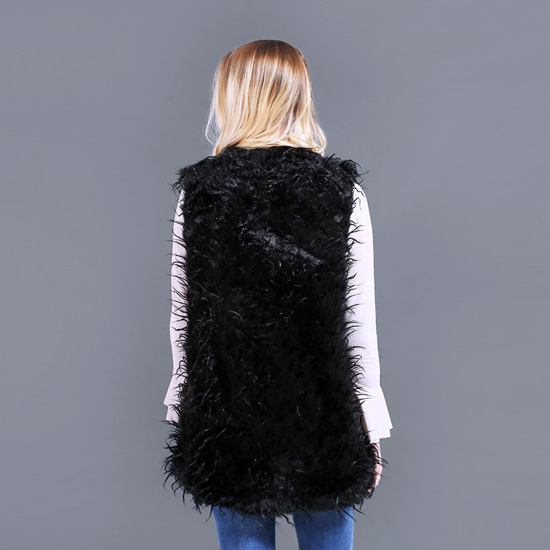 Damer Fuzzy Kaftan-väst av konstpäls med djup V-ringning och sidofickor Mirla-Eva Jonsson