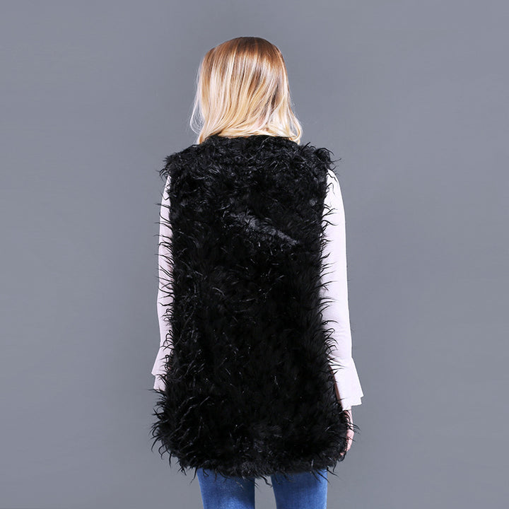 Damer Fuzzy Kaftan-väst av konstpäls med djup V-ringning och sidofickor Mirla-Eva Jonsson