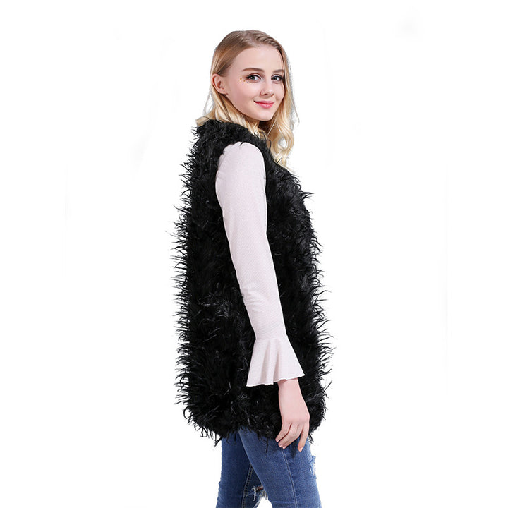Damer Fuzzy Kaftan-väst av konstpäls med djup V-ringning och sidofickor Mirla-Eva Jonsson