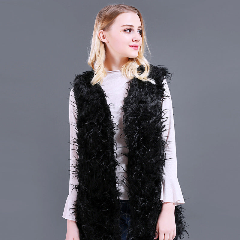 Damer Fuzzy Kaftan-väst av konstpäls med djup V-ringning och sidofickor Mirla-Eva Jonsson