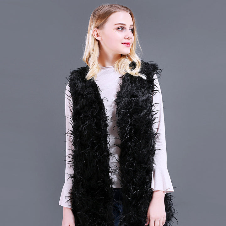 Damer Fuzzy Kaftan-väst av konstpäls med djup V-ringning och sidofickor Mirla-Eva Jonsson