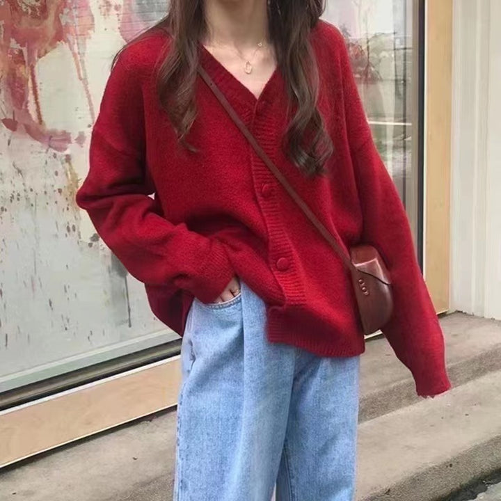 Damer Fuzzy Stickad cardigan med knapplist och lös passform Eva Jonsson-Eva Jonsson