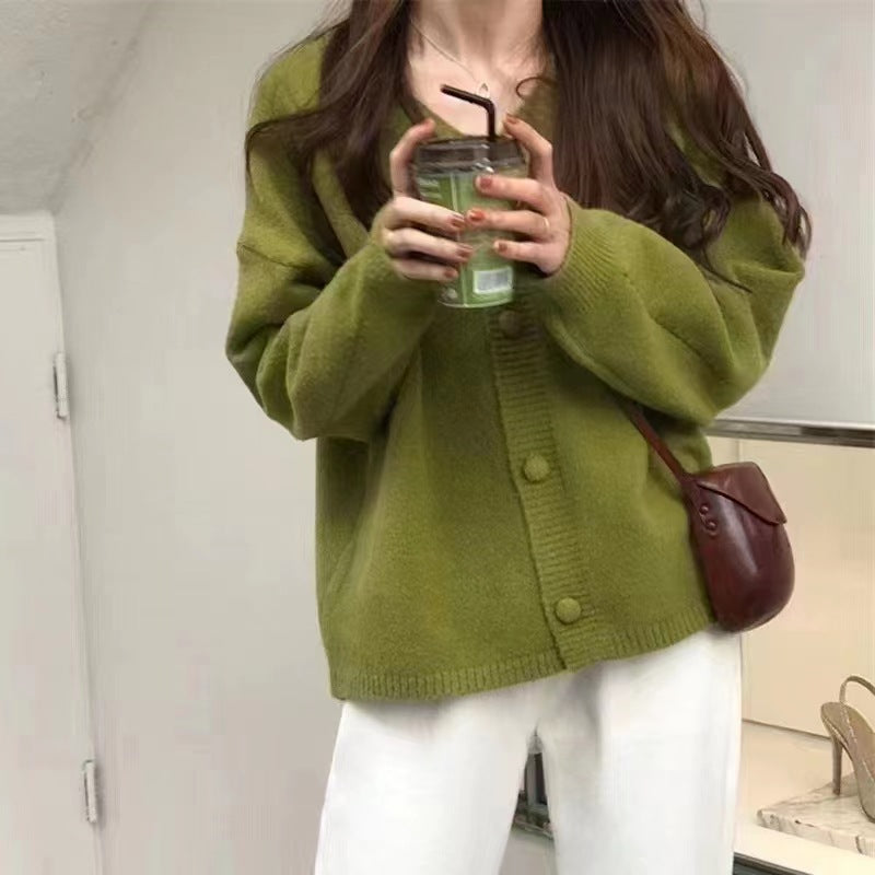 Damer Fuzzy Stickad cardigan med knapplist och lös passform Eva Jonsson-Eva Jonsson