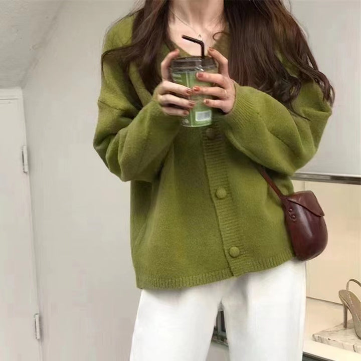 Damer Fuzzy Stickad cardigan med knapplist och lös passform Eva Jonsson-Eva Jonsson