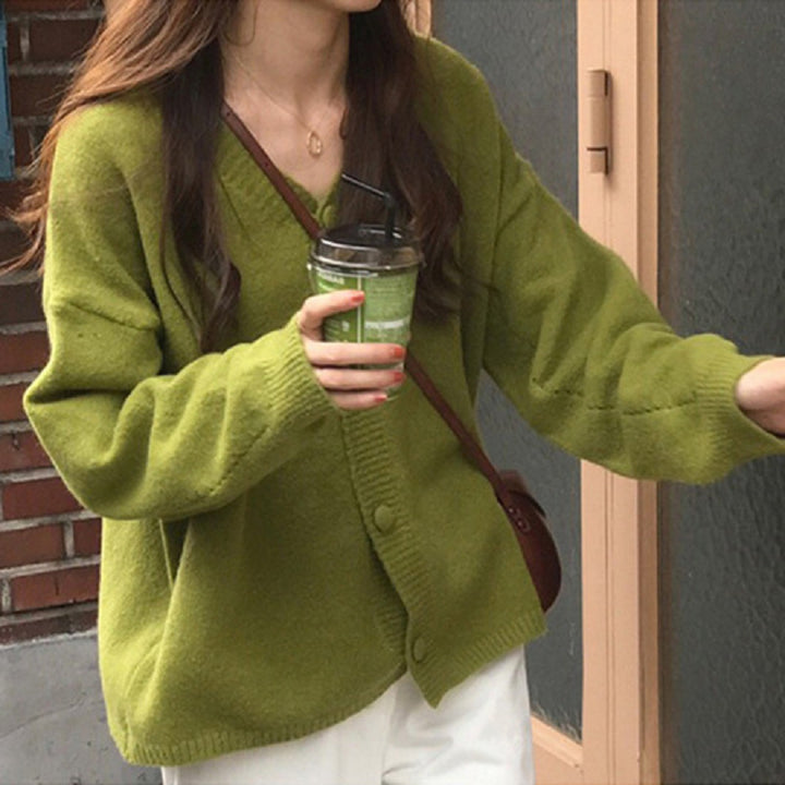 Damer Fuzzy Stickad cardigan med knapplist och lös passform Eva Jonsson-Eva Jonsson