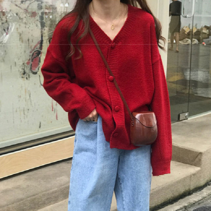 Damer Fuzzy Stickad cardigan med knapplist och lös passform Eva Jonsson-Eva Jonsson