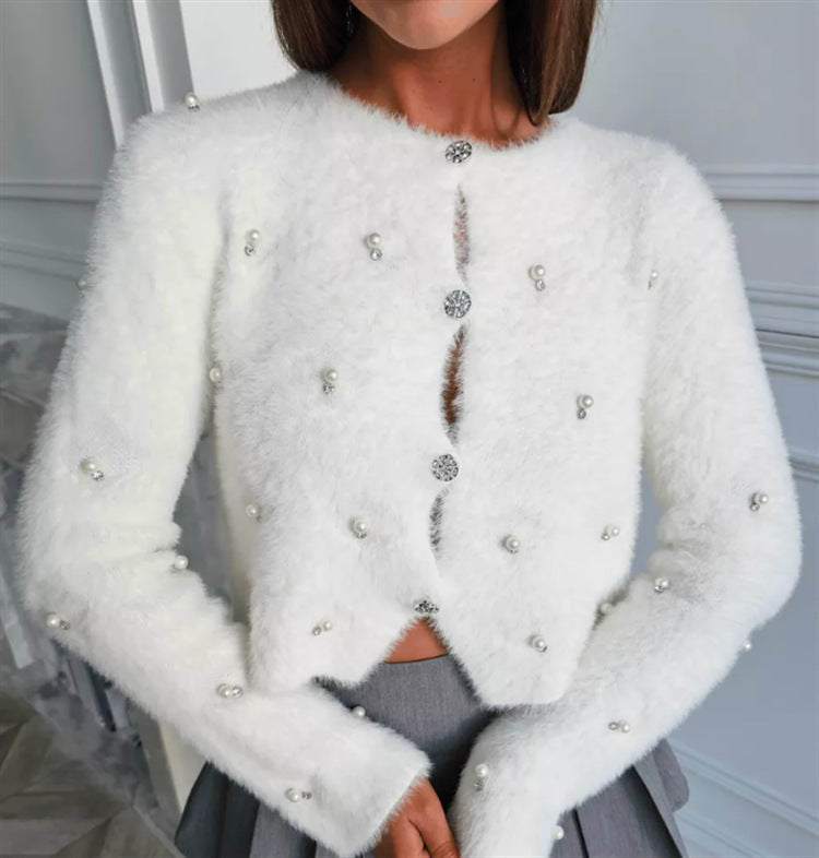 Damer Fuzzy kofta med smyckesknappar och elegant skärning Mirla-Eva Jonsson
