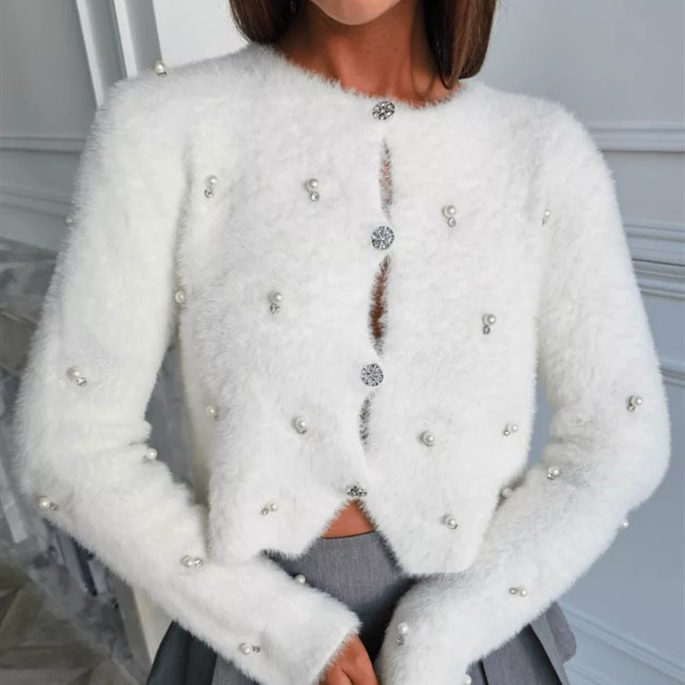 Damer Fuzzy kofta med smyckesknappar och elegant skärning Mirla-Eva Jonsson