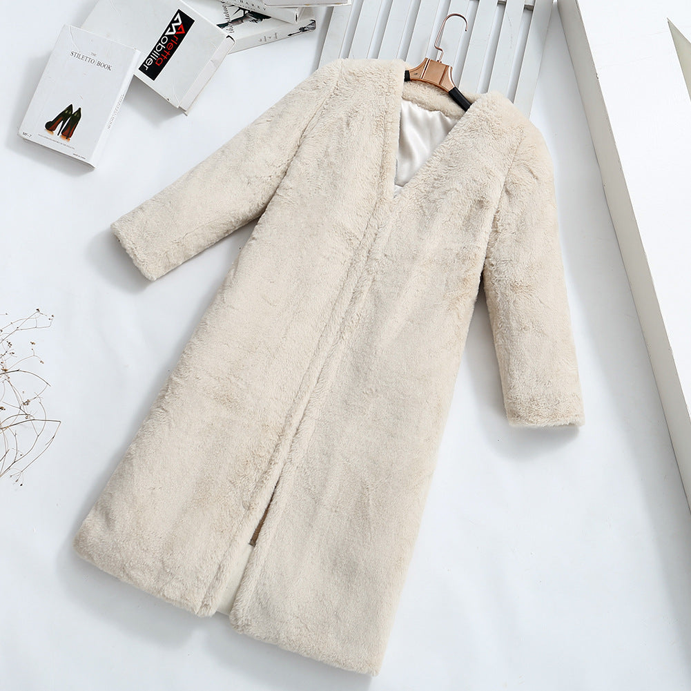 Damer Fuzzy konstfleece-kappa med elegant V-hals och praktiska fickor Mirla-Eva Jonsson