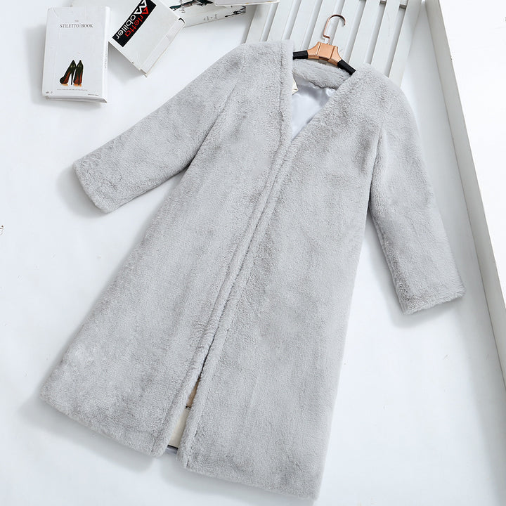 Damer Fuzzy konstfleece-kappa med elegant V-hals och praktiska fickor Mirla-Eva Jonsson