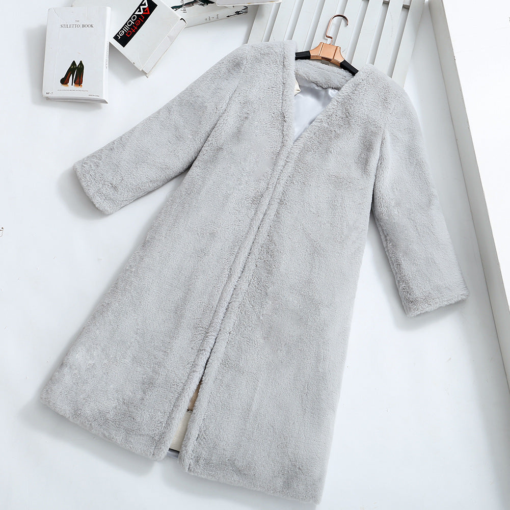 Damer Fuzzy konstfleece-kappa med elegant V-hals och praktiska fickor Mirla-Eva Jonsson
