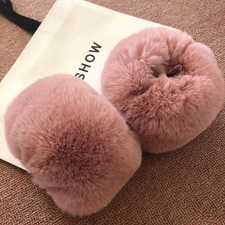Damer Fuzzy konstfleece öronvärmare Mirla-Eva Jonsson