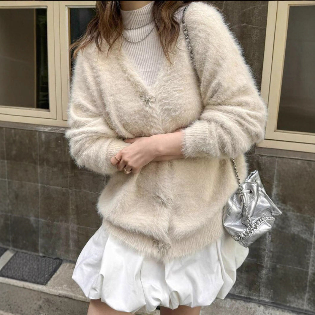 Damer Fuzzy stickad cardigan med eleganta knapppdetaljer Eva Jonsson-Eva Jonsson