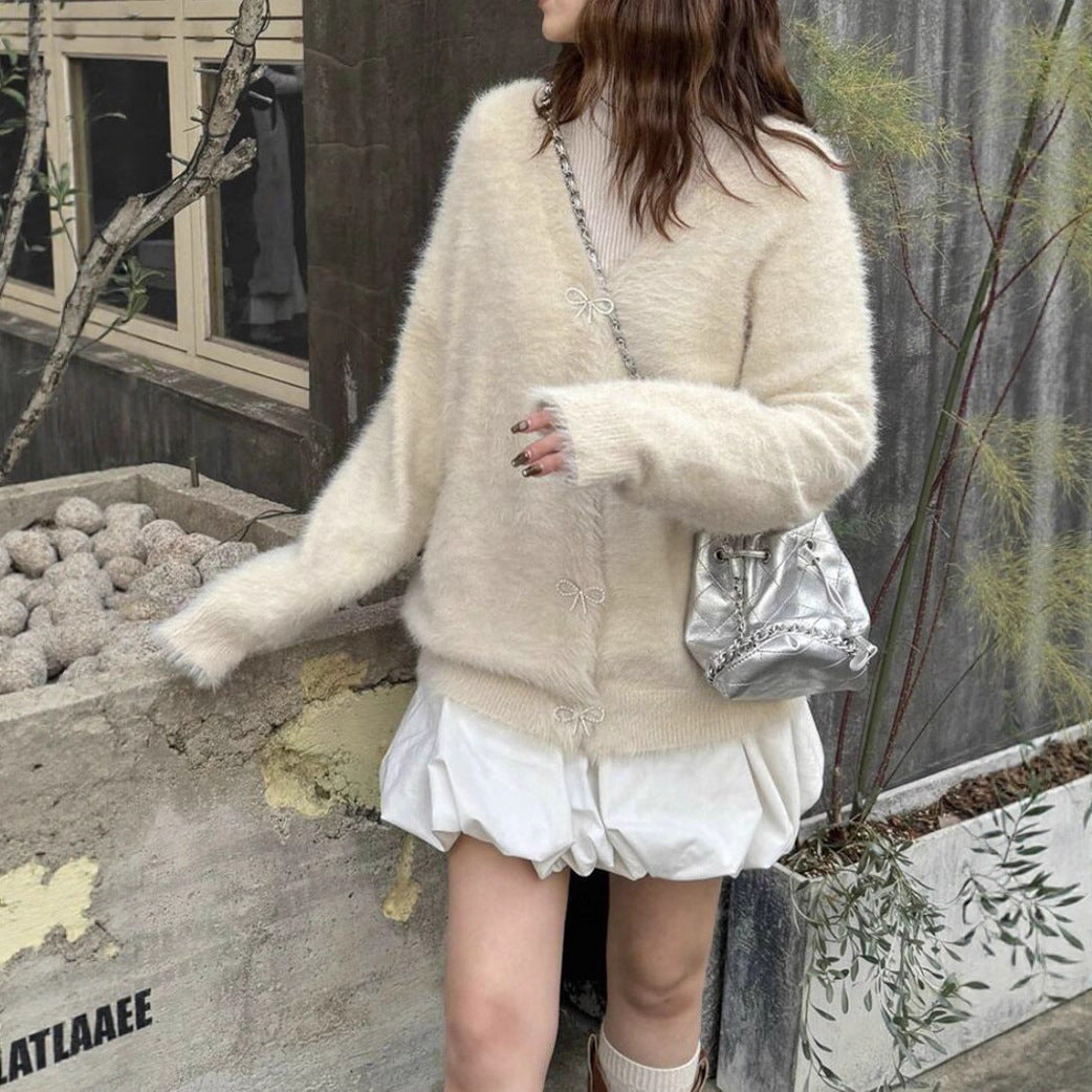 Damer Fuzzy stickad cardigan med eleganta knapppdetaljer Eva Jonsson-Eva Jonsson