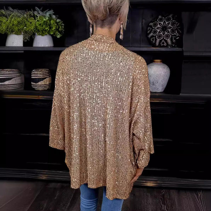 Damer Glamorösa Übergångsjacka med Glittrande Accenter och Vida Ärmar Mirla-Eva Jonsson
