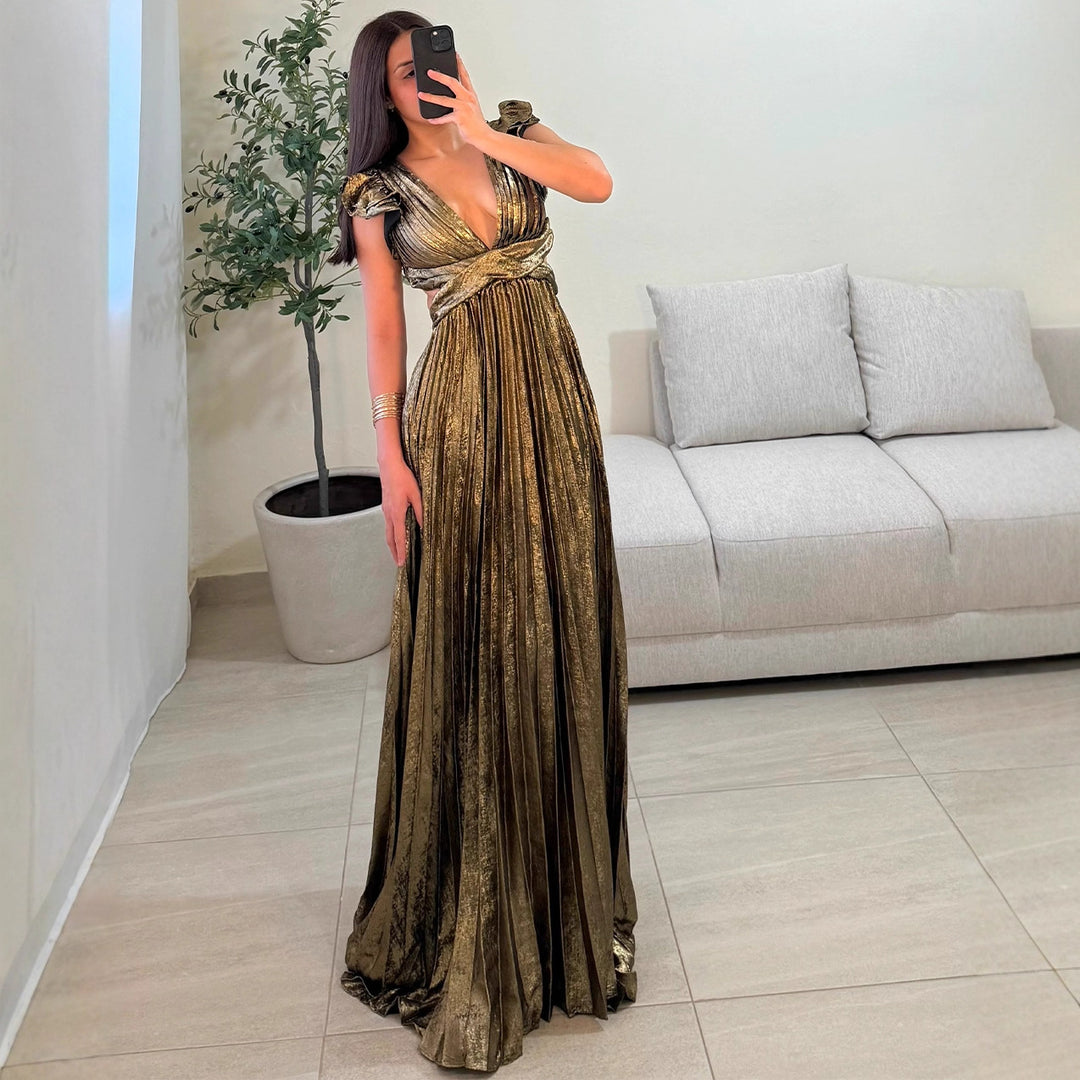 Damer Glamorous Plisserad Maxi Klänning med Djup V-Hals och Puffärmar Mirla-Eva Jonsson