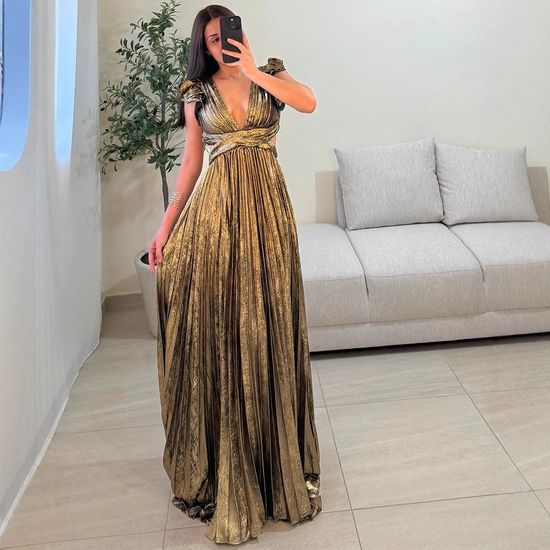Damer Glamorous Plisserad Maxi Klänning med Djup V-Hals och Puffärmar Mirla-Eva Jonsson