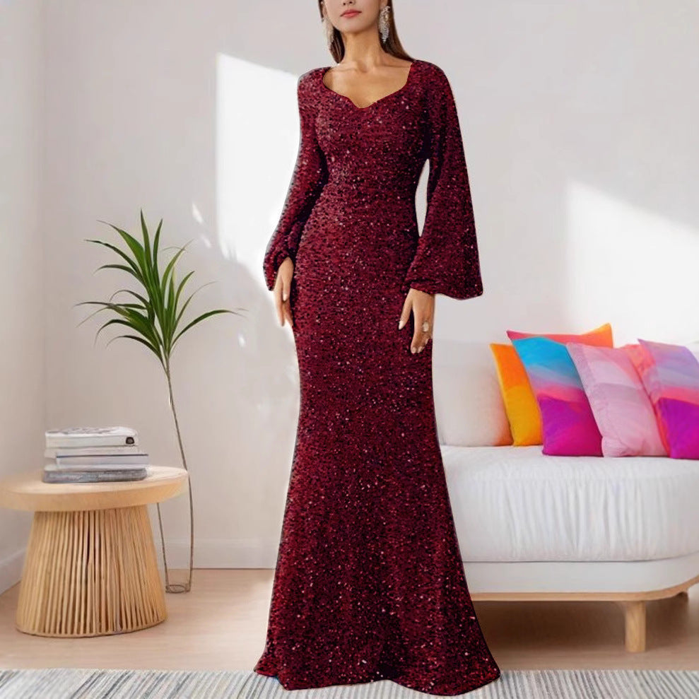 Damer Glamourös Glitter Kvällsklänning med Svängande Kjol och Voluminösa Ärmar Mirla-Eva Jonsson