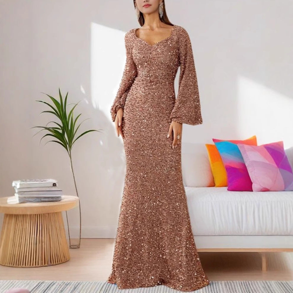 Damer Glamourös Glitter Kvällsklänning med Svängande Kjol och Voluminösa Ärmar Mirla-Eva Jonsson