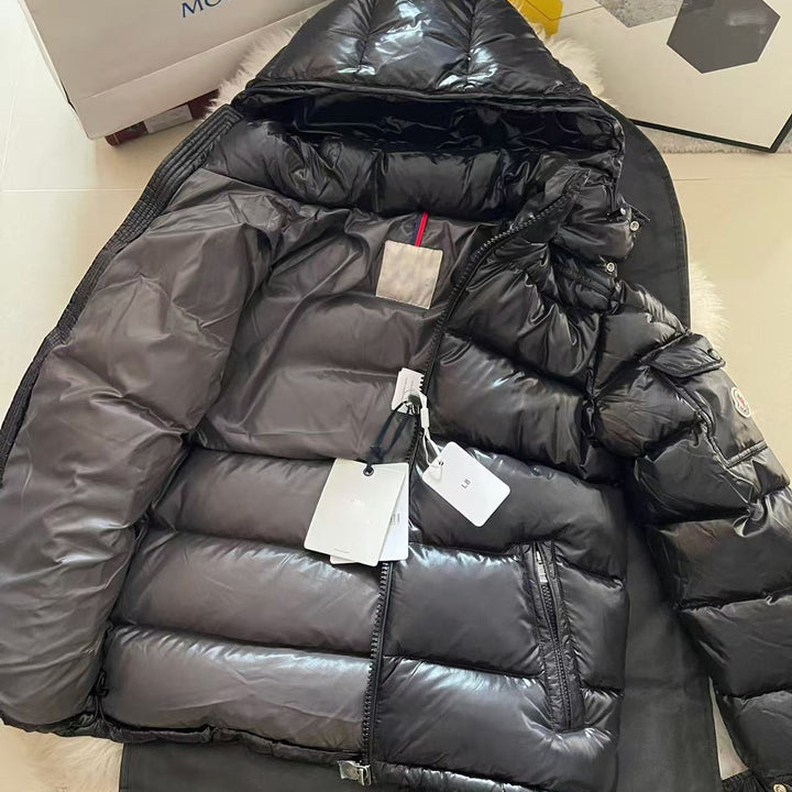 Damer Glansig Vinterjacka med oversized passform och huva Mirla-Eva Jonsson