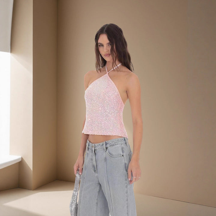 Damer Glittrande Crop-Top med smala axelband och asymmetrisk design Mirla-Eva Jonsson