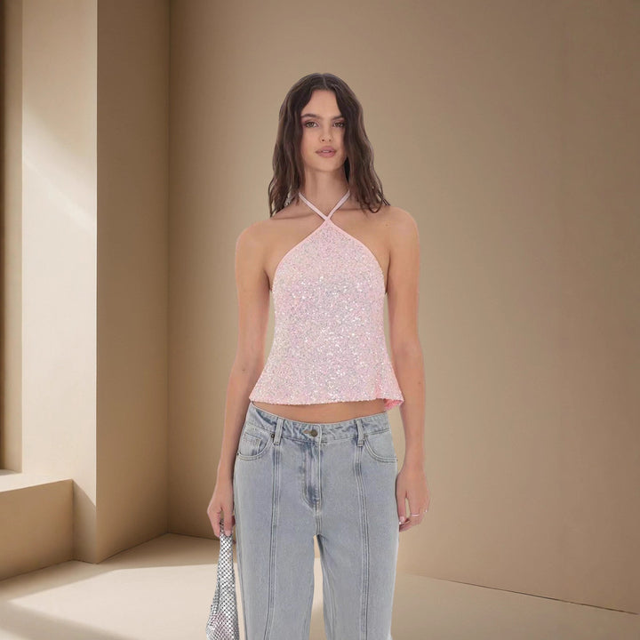 Damer Glittrande Crop-Top med smala axelband och asymmetrisk design Mirla-Eva Jonsson