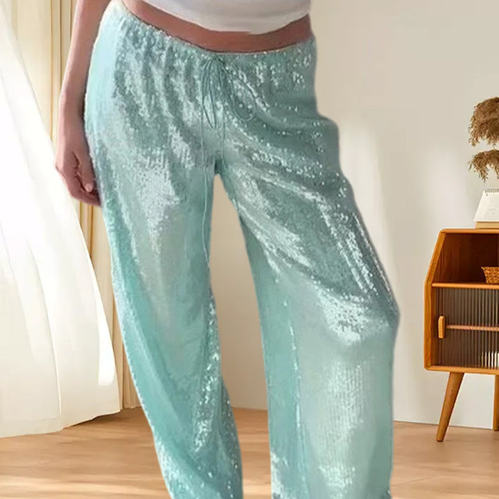 Damer Glittrande Fritidsbyxor med vid passform och elastisk midja Mirla-Eva Jonsson