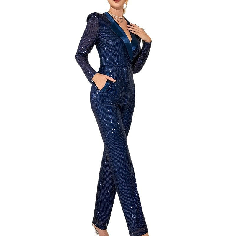Damer Glittrande Jumpsuit med Figurformande Snitt och Elegant V-Hals Mirla-Eva Jonsson