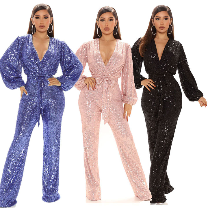 Damer Glittrande Jumpsuit med djup V-ringning och voluminösa ärmar Mirla-Eva Jonsson