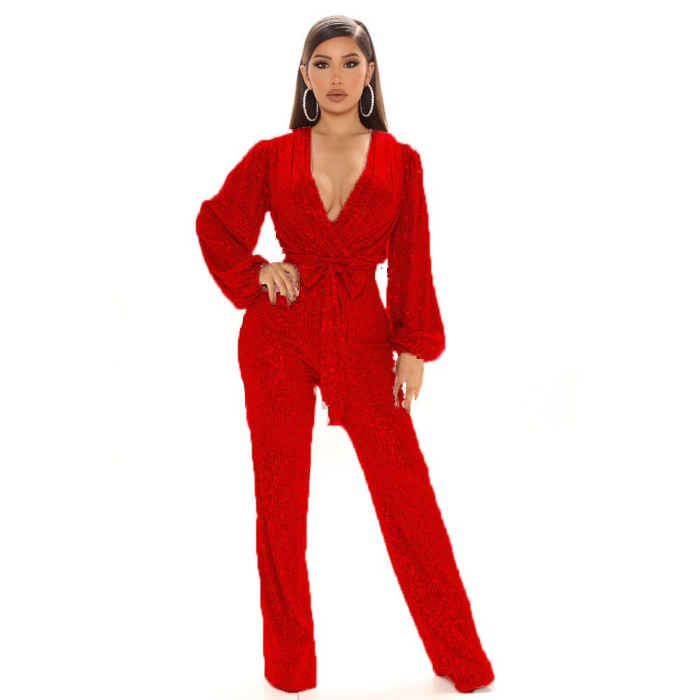 Damer Glittrande Jumpsuit med djup V-ringning och voluminösa ärmar Mirla-Eva Jonsson