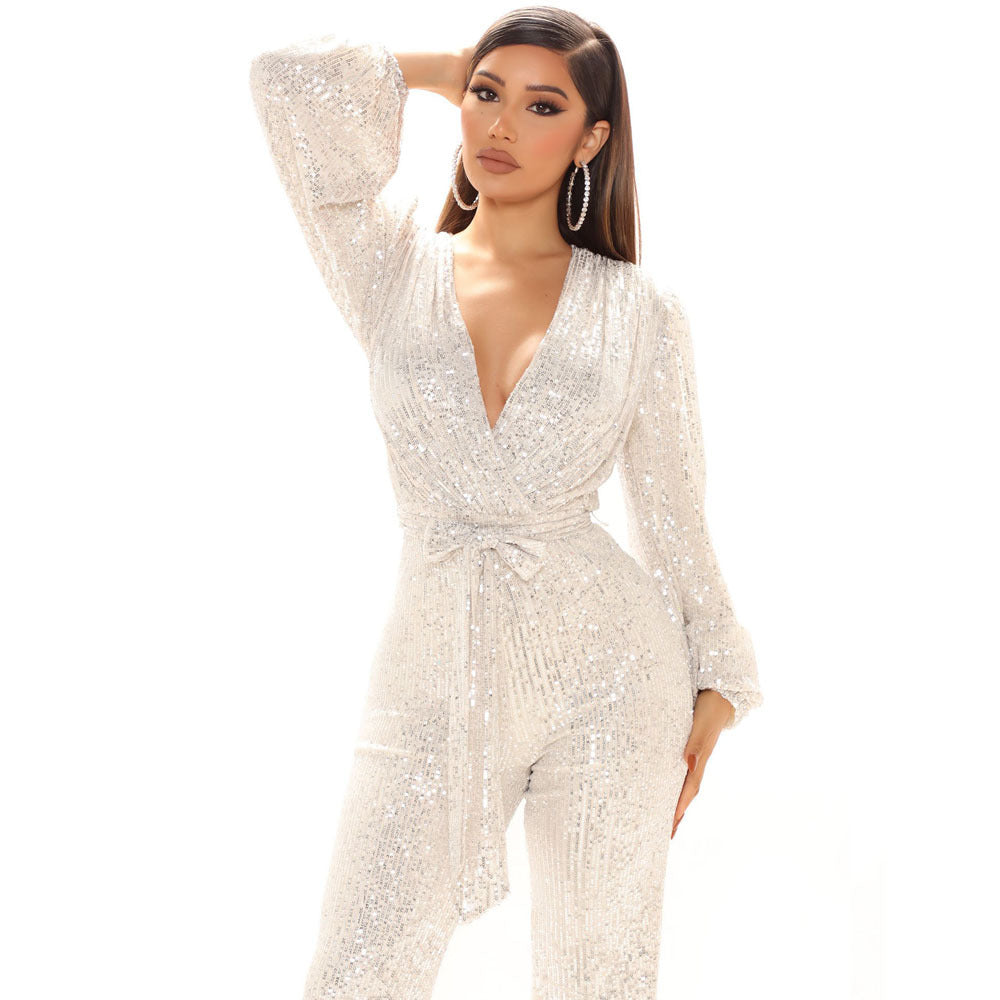 Damer Glittrande Jumpsuit med djup V-ringning och voluminösa ärmar Mirla-Eva Jonsson