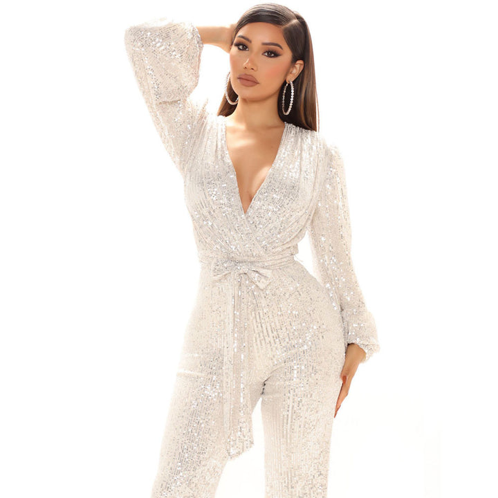 Damer Glittrande Jumpsuit med djup V-ringning och voluminösa ärmar Mirla-Eva Jonsson