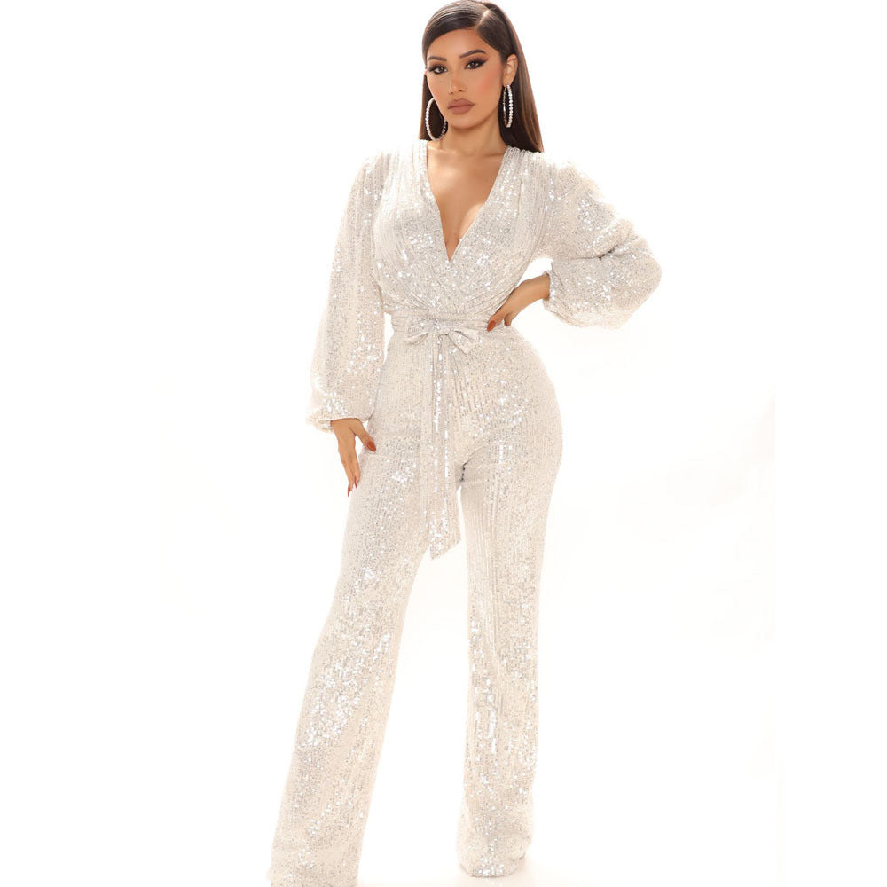 Damer Glittrande Jumpsuit med djup V-ringning och voluminösa ärmar Mirla-Eva Jonsson