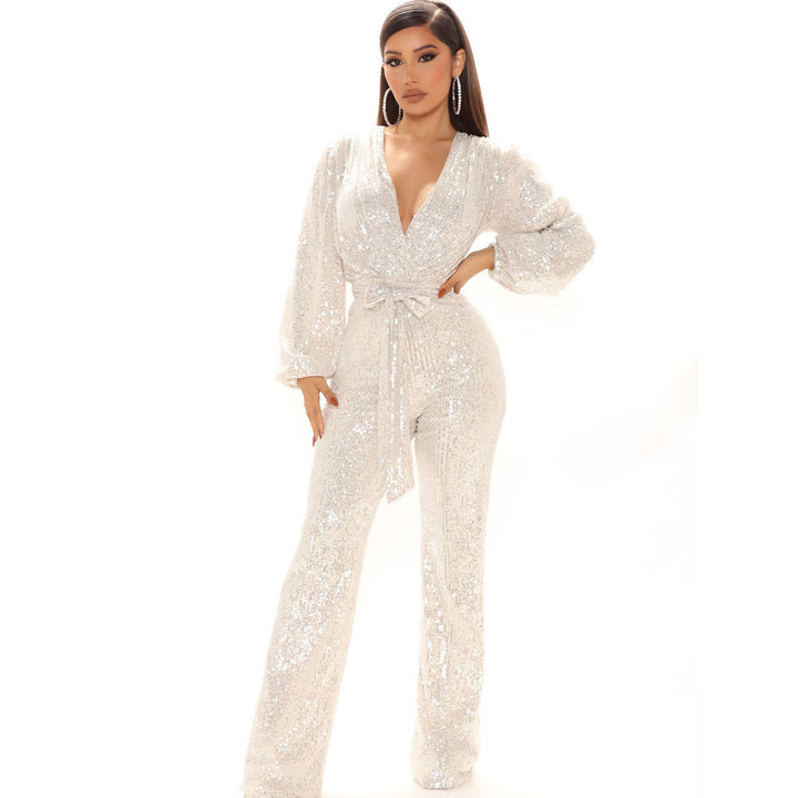 Damer Glittrande Jumpsuit med djup V-ringning och voluminösa ärmar Mirla-Eva Jonsson