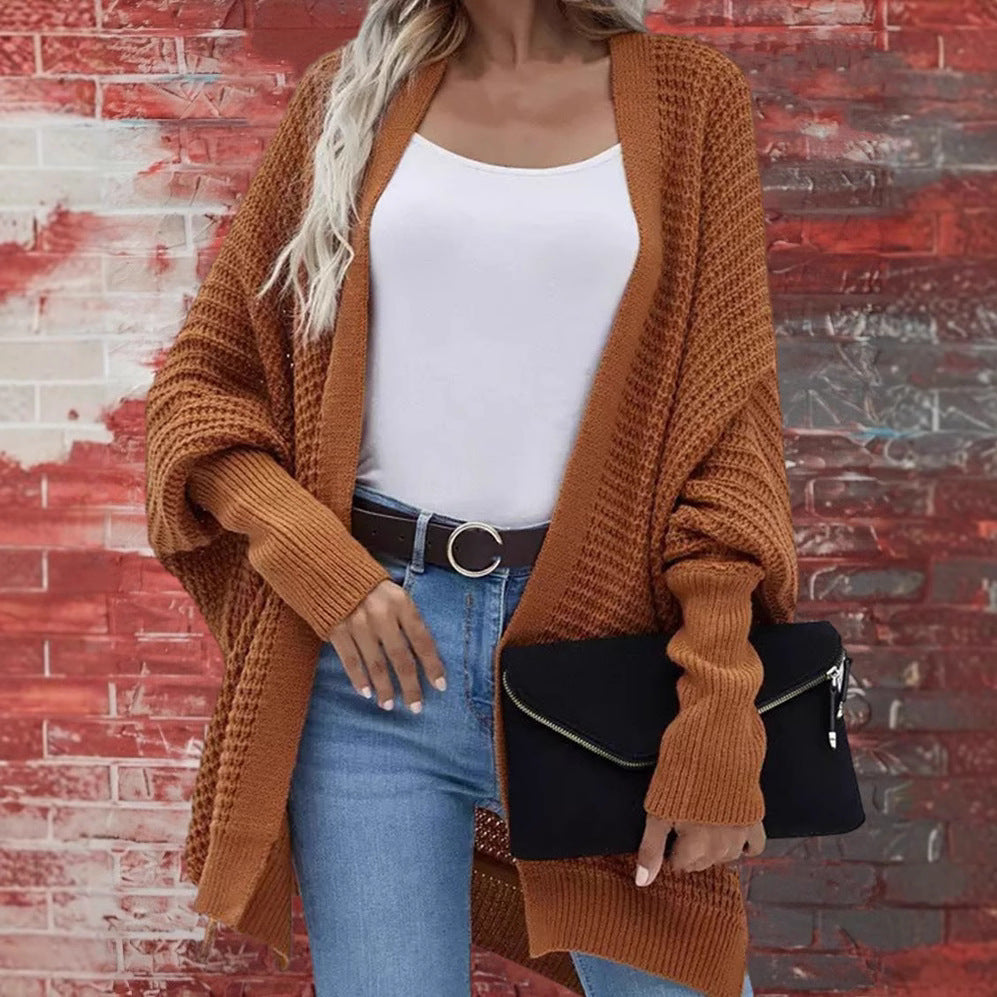 Damer Grovstickad Cardigan i avslappnad design med bred passform och fin struktur Mirla-Eva Jonsson