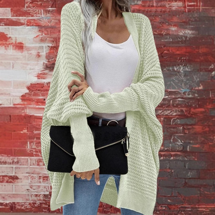 Damer Grovstickad Cardigan i avslappnad design med bred passform och fin struktur Mirla-Eva Jonsson