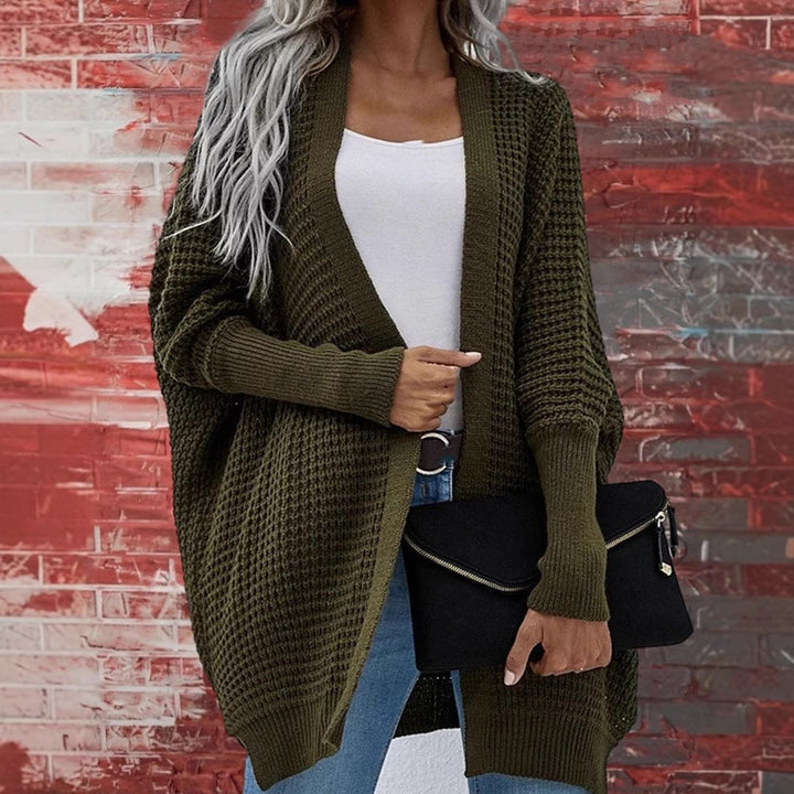 Damer Grovstickad Cardigan i avslappnad design med bred passform och fin struktur Mirla-Eva Jonsson