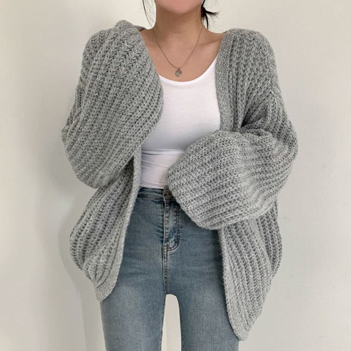 Damer Grovstickad Cardigan med Avslappnad Passform och Voluminösa Ärmar Mirla-Eva Jonsson