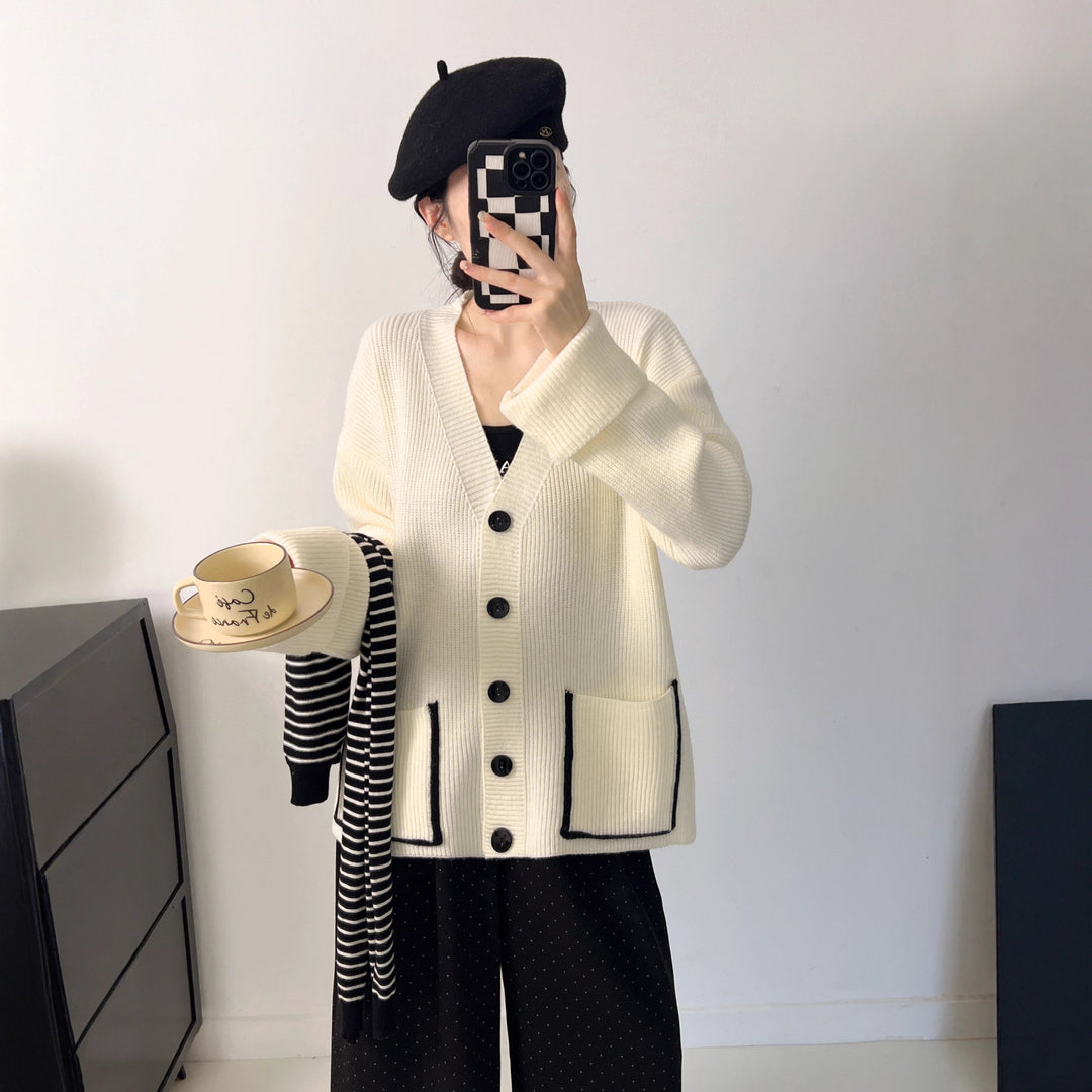 Damer Grovstickad Cardigan med Djupa Fickor och Elegant Knapplist Mirla-Eva Jonsson