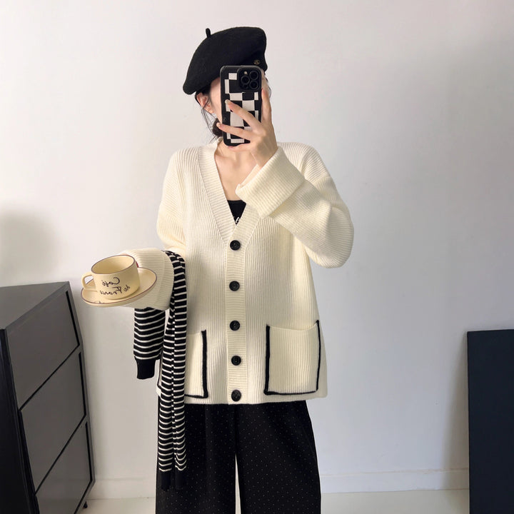 Damer Grovstickad Cardigan med Djupa Fickor och Elegant Knapplist Mirla-Eva Jonsson